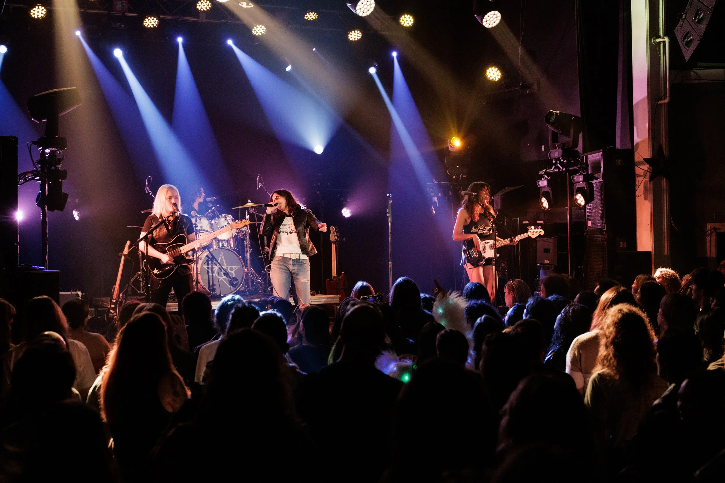 The Aces performing on tour